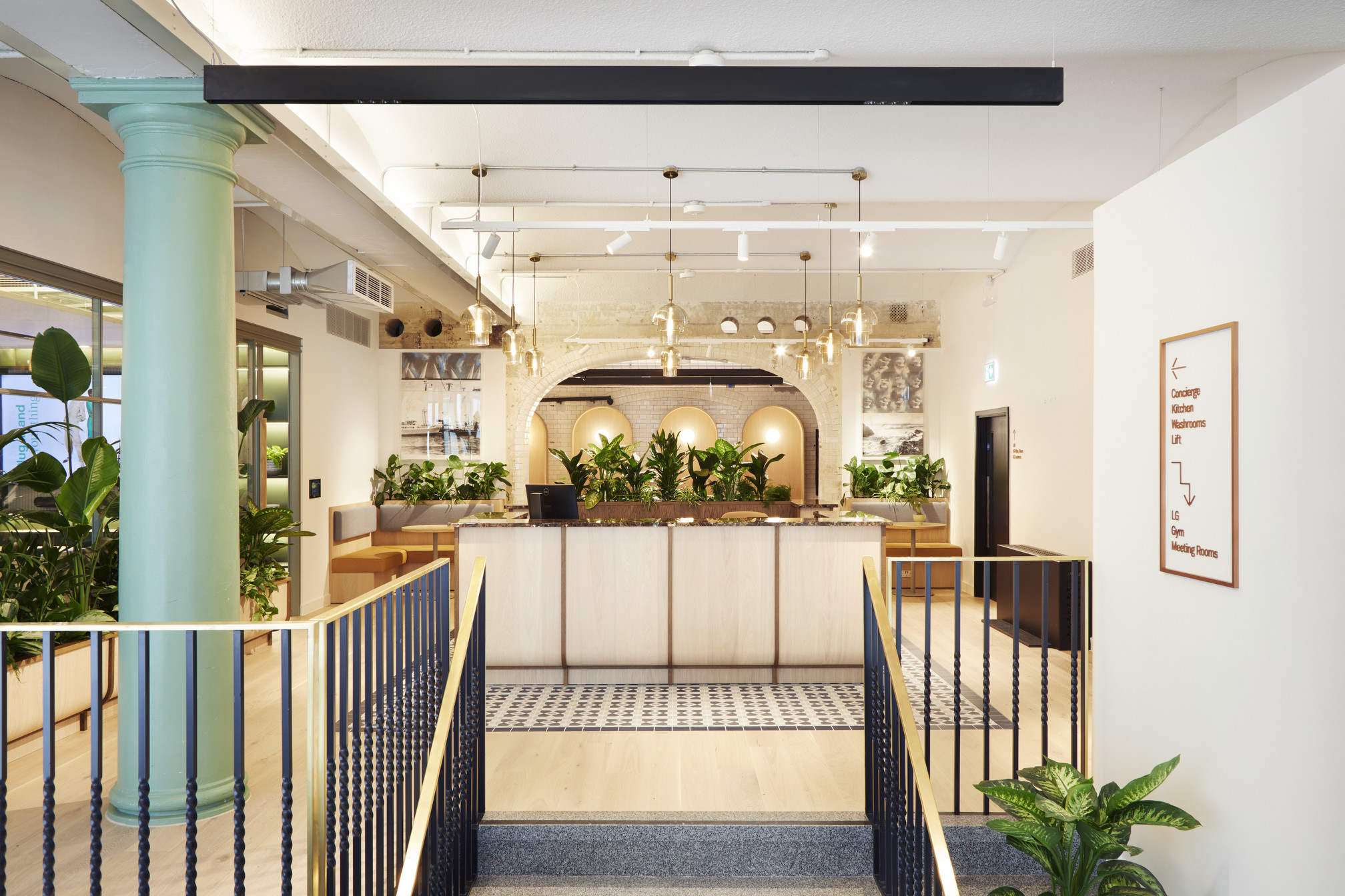 Welcoming reception area at Fora Greencoat Place co-working space, designed by Modus. The space blends greenery, modern lighting, and a bright aesthetic to greet and inspire members as they enter.