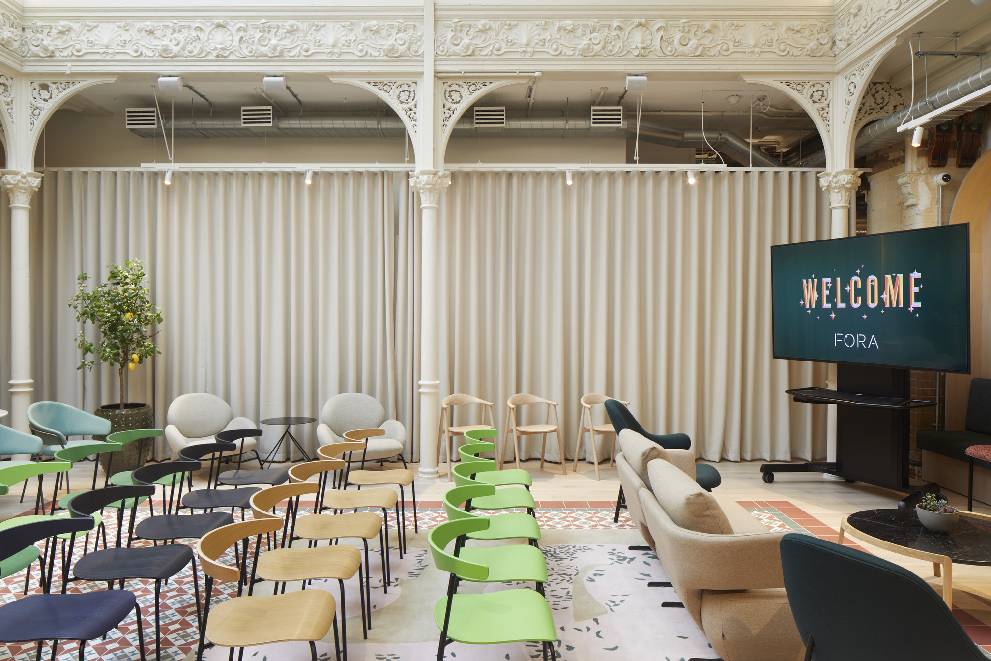 Versatile event space at Fora Greencoat Place co-working space, designed by Modus, featuring flexible seating arrangements, historic architecture, and modern amenities, ideal for workshops, presentations, and community events.