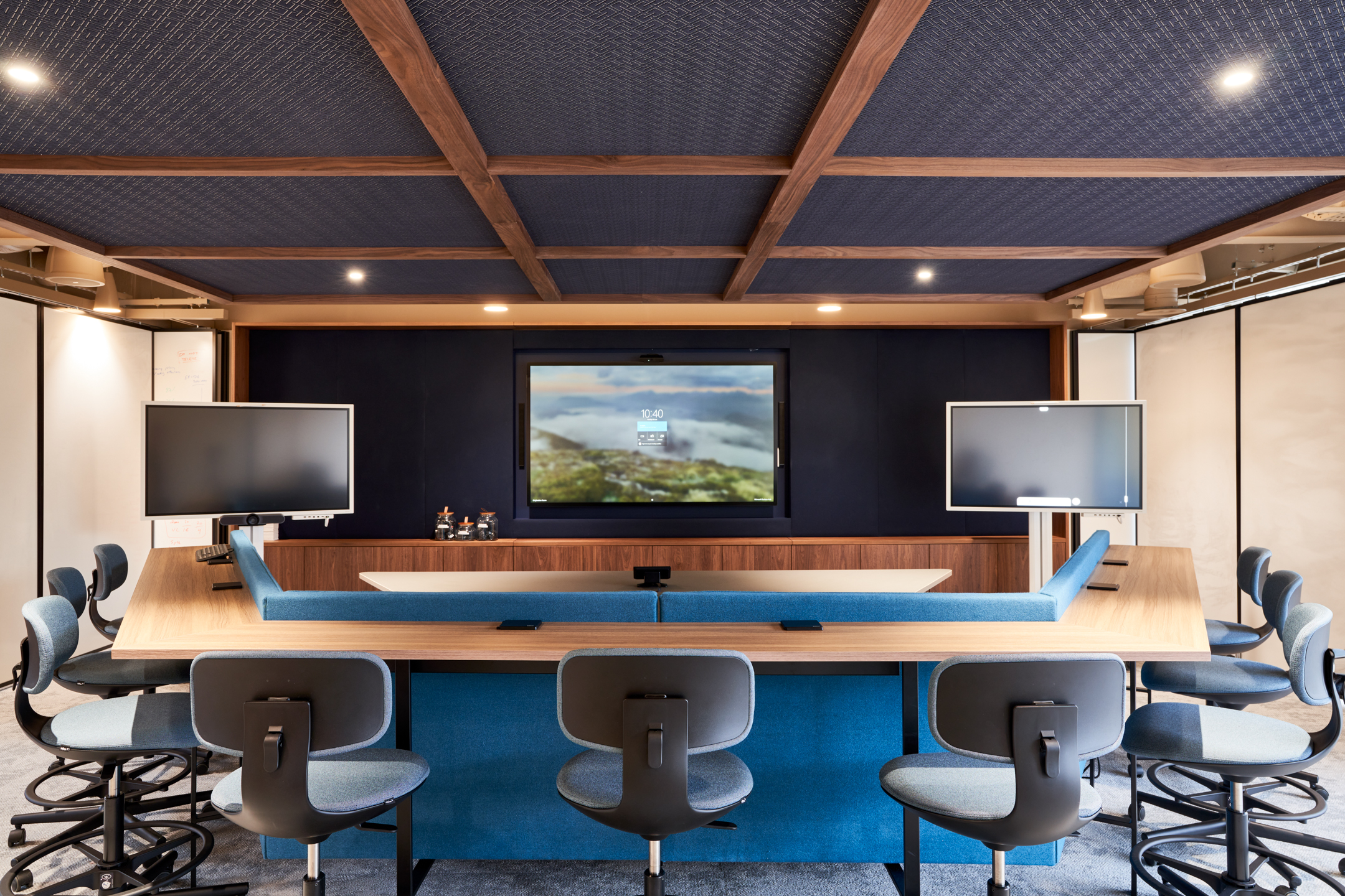 A high-tech meeting room at a private equity firm in Marylebone, designed by Modus Workspace. Equipped with large display screens and ergonomic seating, this room provides a modern, collaborative space for brainstorming and strategic planning sessions.