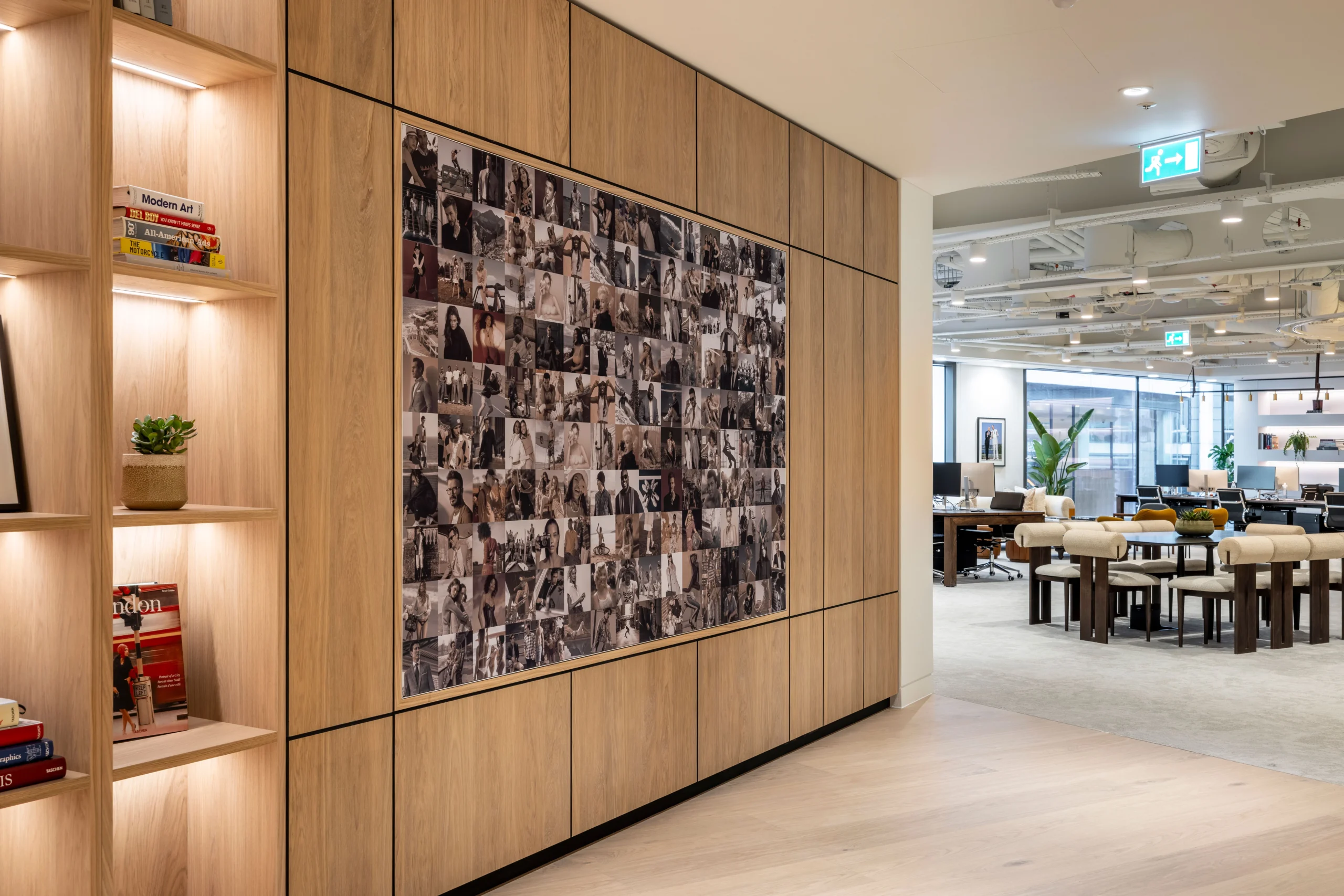 A wide view of the lounge and bar area at Authentic Brand Group, designed by Modus, features comfortable seating, warm lighting, and a welcoming environment for casual meetings or relaxation.