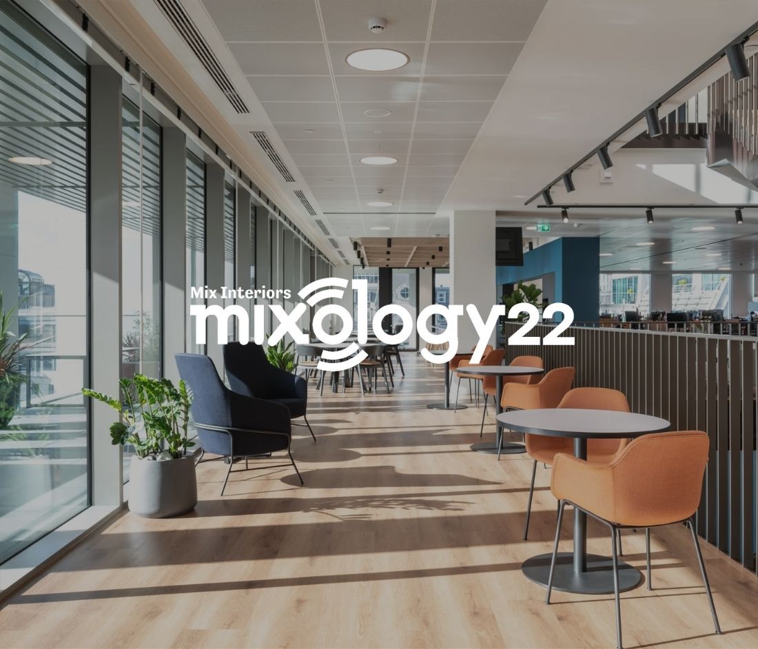 Mixology22 logo overlaying the interior of the Numis office, featuring modern seating areas, natural light, and open spaces. This project was the Mixology Award winner in 2022