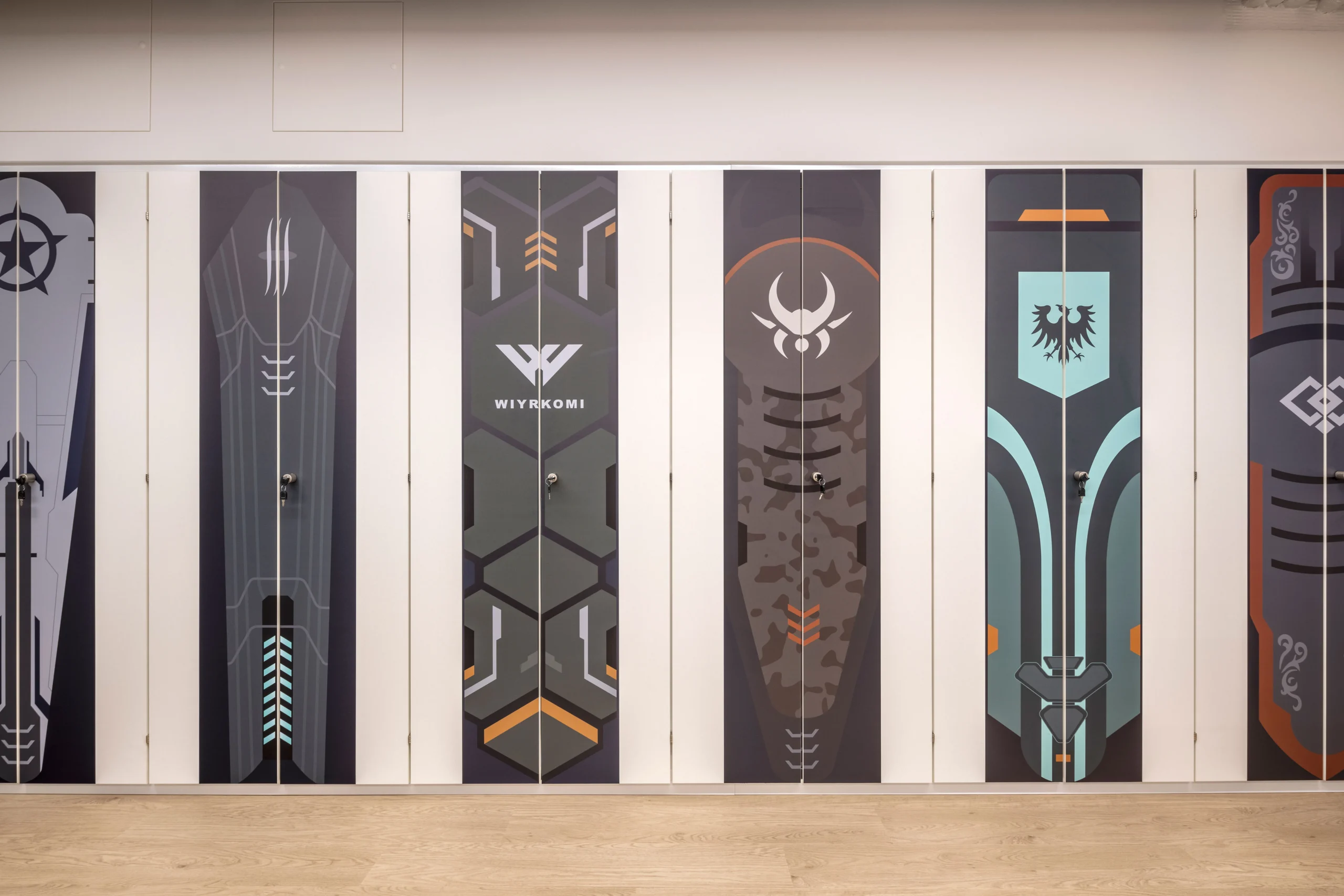 Custom-designed lockers featuring unique graphics inspired by CCP Games' branding at their London workspace.