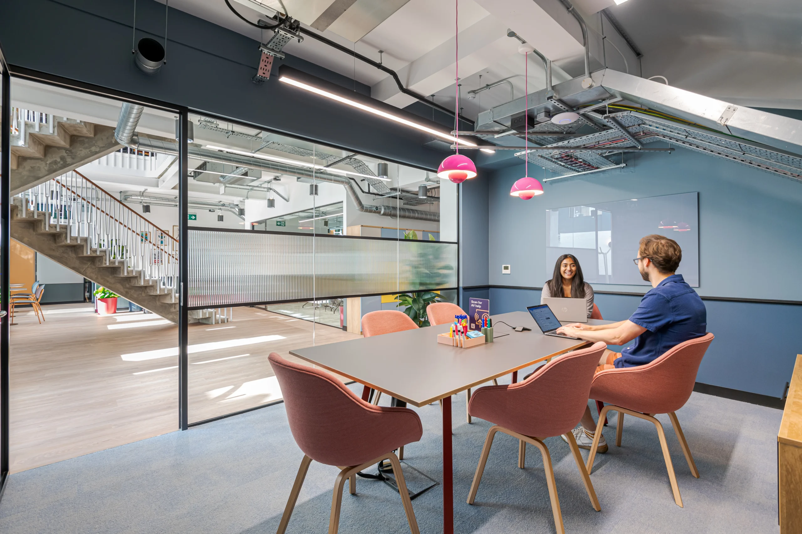 Meeting Room with work benches to the side