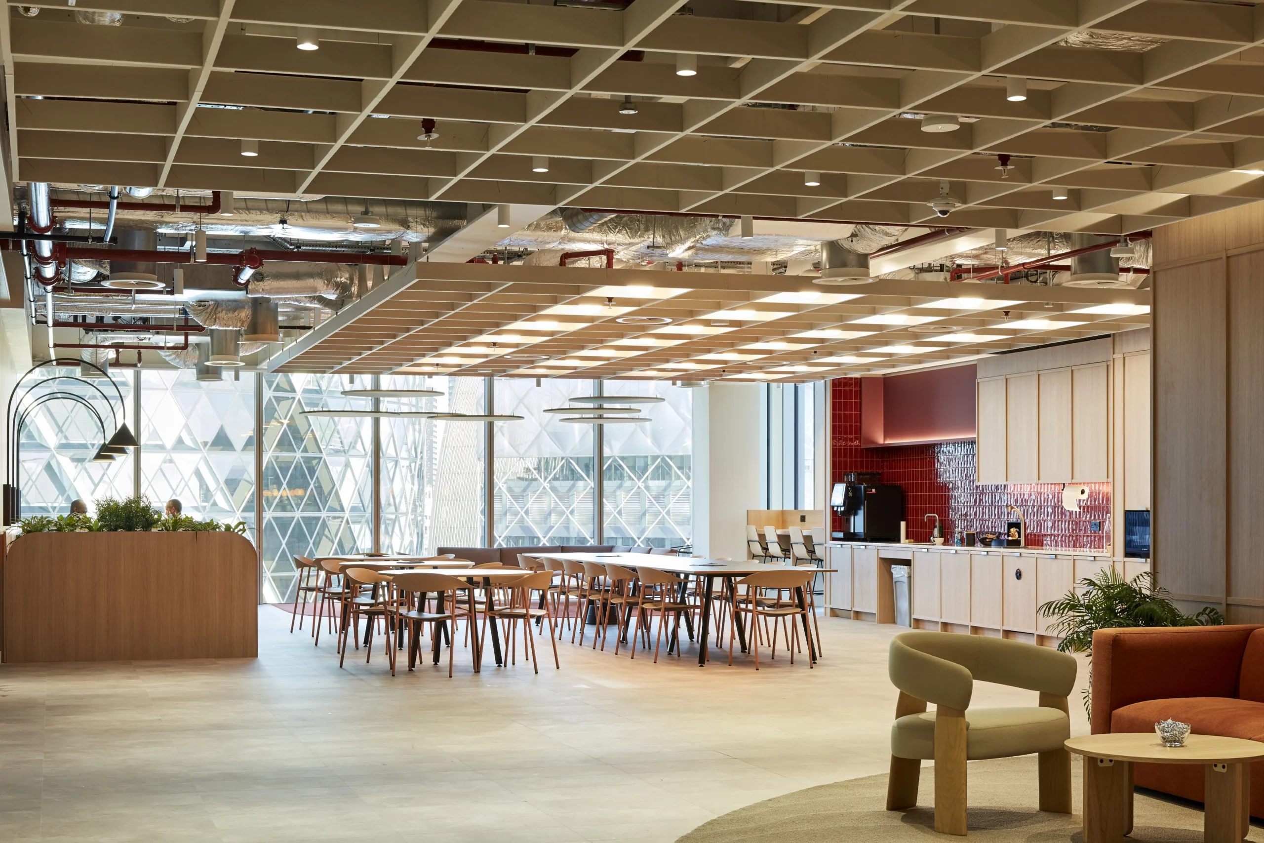 Open-plan office area with modern desk seating, designed for flexibility and team connectivity