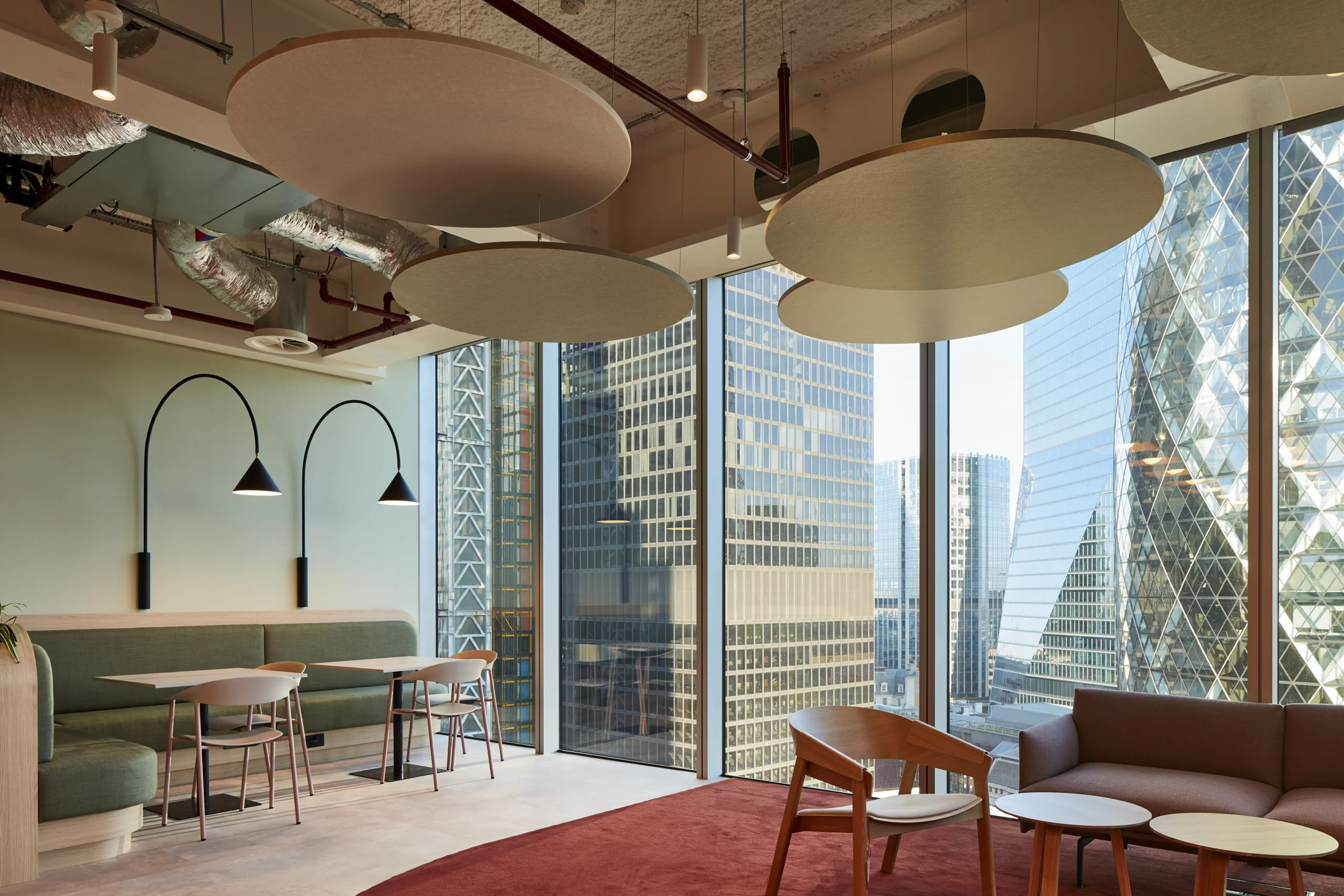 Open-plan office area with modern desk seating, designed for flexibility and team connectivity