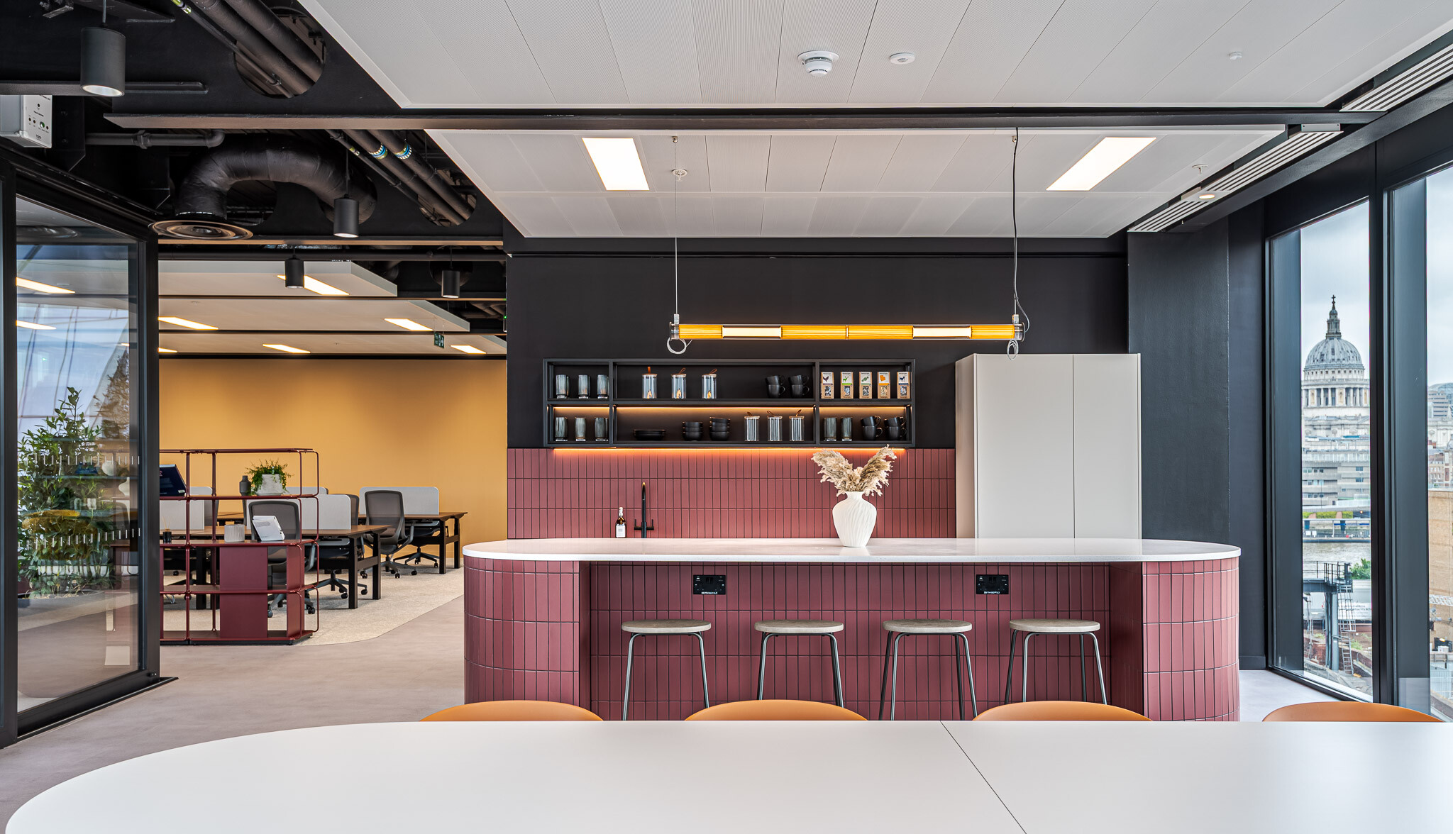 Arbor teapoint with curved terracotta-tiled island, open shelving and views of St Paul’s Cathedral.